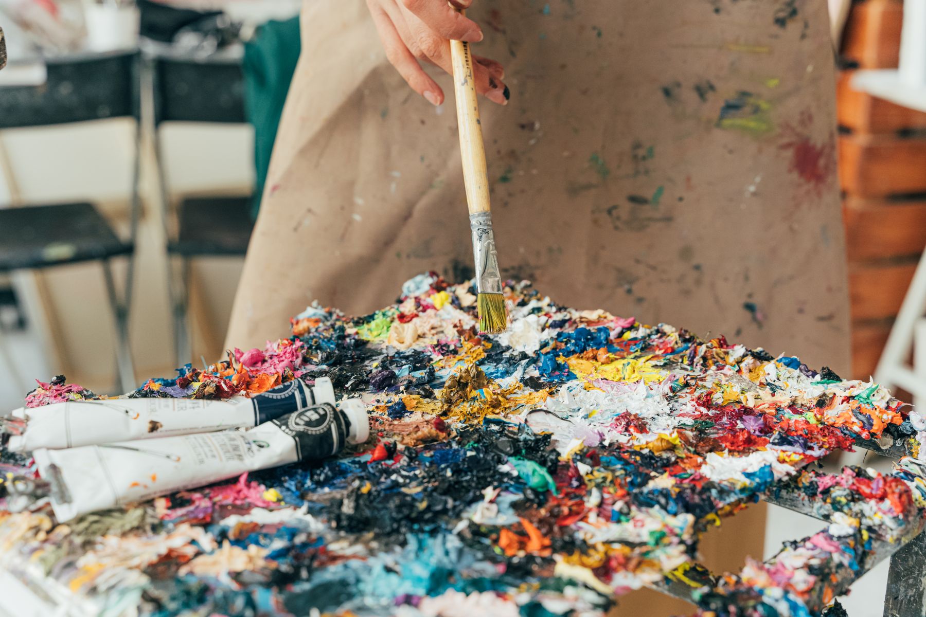 Thick oil paint on an artist's palette